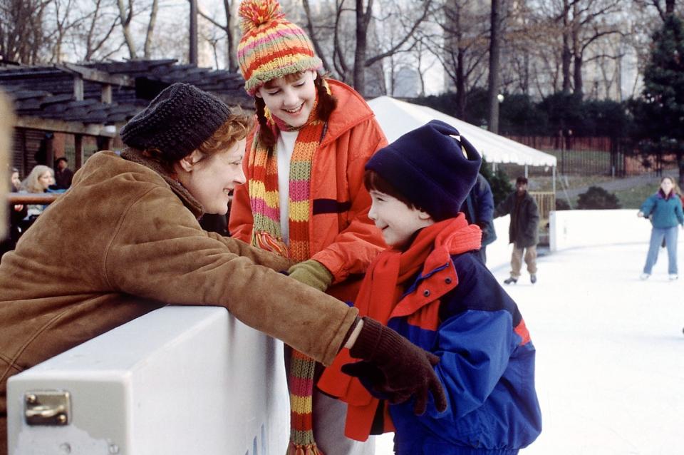 Susan Sarandon, Jena Malone, and Liam Aiken at an ice skating rink in "Stepmom"