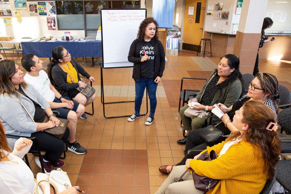 A break-out group discusses gun vioence during a Community Violence Reduction Initiative session Friday night at Chemeketa Community College.