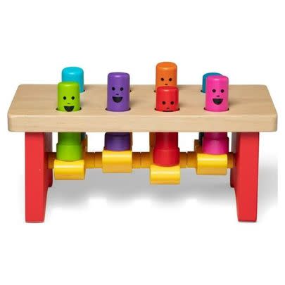 A play bench with happy pegs