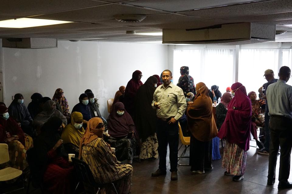 Mustafa Hassan, center, and other workers gather Friday, Oct. 6, 2023, at the Somali Community Association of Ohio office on Columbus' Northeast Side after they walked off the job to protest a new prayer policy.