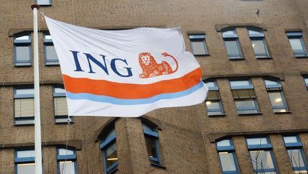 A flag showing the logo of ING Group NV flutters in the wind at a branch office in Amsterdam January 9, 2014. REUTERS/Toussaint Kluiters/United Photos