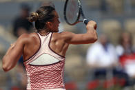 Aryna Sabalenka of Belarus plays a shot against Ukraine's Elina Svitolina during their quarter final match of the French Open tennis tournament at the Roland Garros stadium in Paris, Tuesday, June 6, 2023. (AP Photo/Aurelien Morissard)