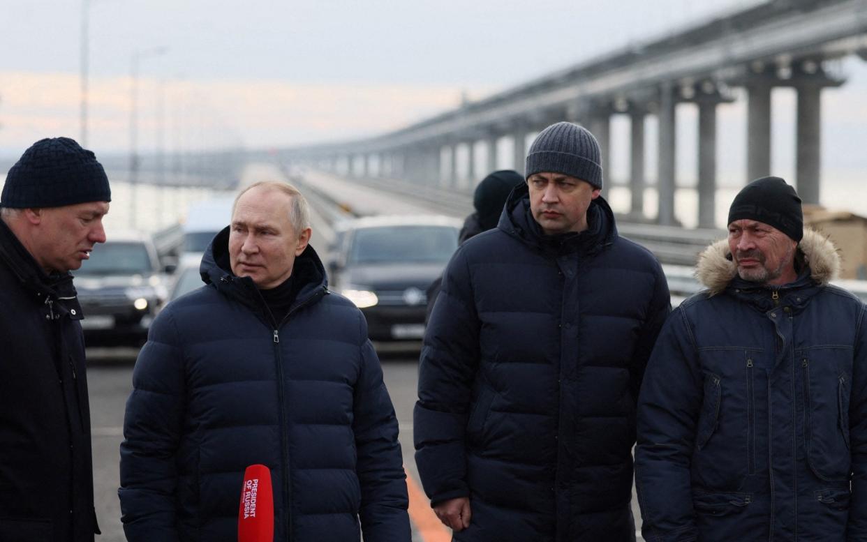 Russian President Vladimir Putin visits a bridge connecting the Russian mainland with the Crimean Peninsula across the Kerch Strait, December 5, 2022. Sputnik/Mikhail Metzel/Pool via REUTERS ATTENTION EDITORS - THIS IMAGE WAS PROVIDED BY A THIRD PARTY. - Sputnik/Mikhail Metzel/Pool via REUTERS