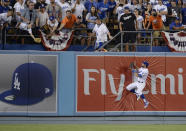 <p>Los Angeles Dodgers outfielder Chris Taylor (3) watches a ball hit for a solo home run by Houston Astros left fielder Marwin Gonzalez (not pictured) in the 9th inning in game two of the 2017 World Series at Dodger Stadium. Mandatory Credit: Gary A. Vasquez-USA TODAY Sports </p>