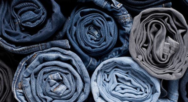 Stack of rolled jeans