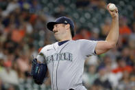 Seattle Mariners starting pitcher Robbie Ray throws against the Houston Astros during the first inning of a baseball game Monday, June 6, 2022, in Houston. (AP Photo/Michael Wyke)
