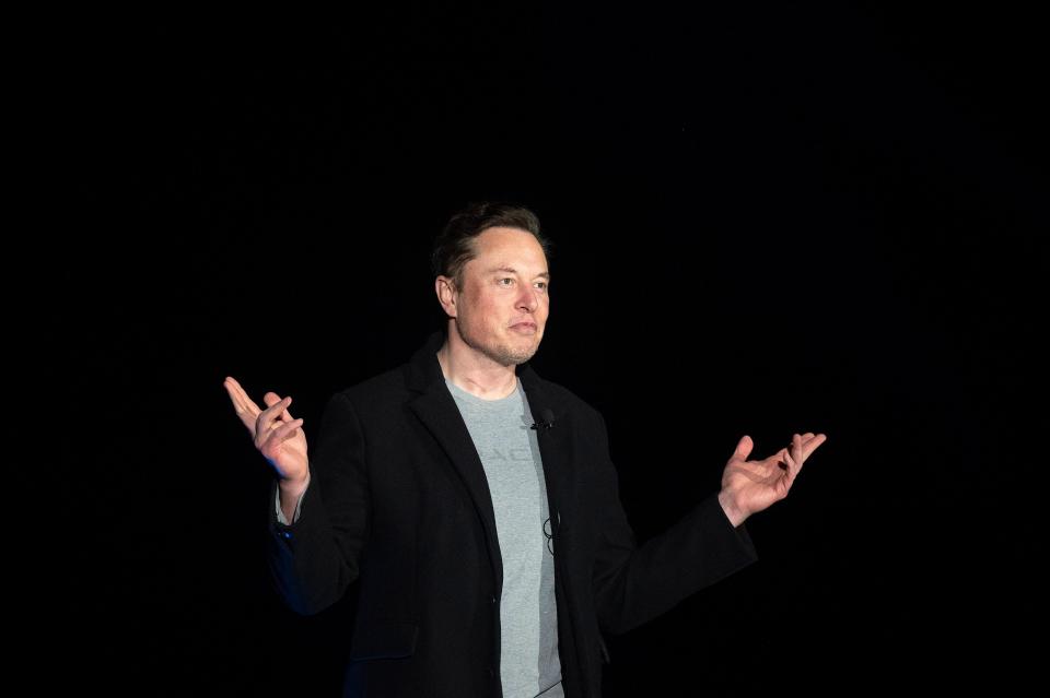 Elon Musk gestures as he speaks during a press conference at SpaceX's Starbase facility near Boca Chica Village in South Texas on February 10, 2022. (Photo by JIM WATSON / AFP) (Photo by JIM WATSON/AFP via Getty Images)