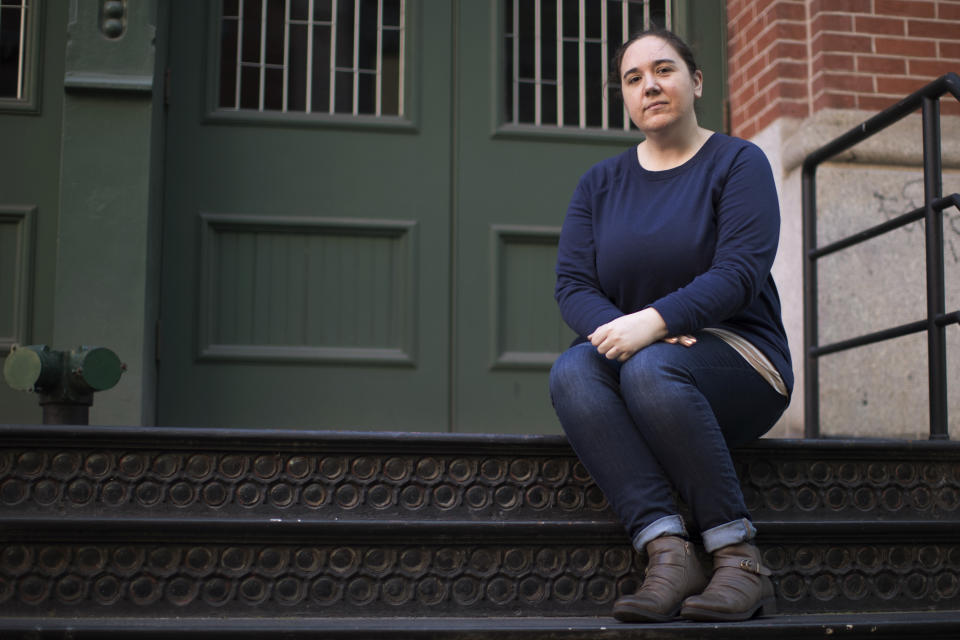 In this Friday, Oct. 12, 2018 photo, Katie Labovitz poses for a portrait in New York. One day after actress Alyssa Milano urged the Twittersphere to join her in sharing a personal story of sexual harassment in the wake of rape allegations against Harvey Weinstein, Labovitz shared a story about being sexually assaulted by a Donald Duck mascot at Epcot Theme Park when she was 15 years old. Labovitz said the overall experience of sharing has been “very empowering but very scary.” (AP Photo/Mary Altaffer)