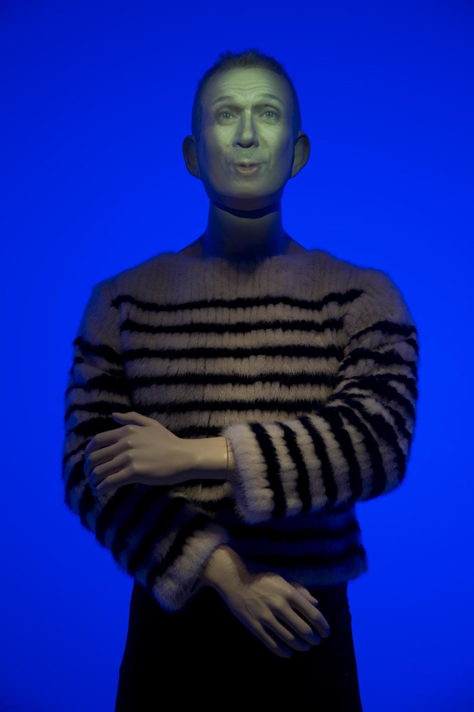 A animated mannequin representing French fashion designer Jean Paul Gaultier is seen during the opening of the exhibit "The Fashion World of Jean Paul Gaultier, from the sidewalk to the catwalk", at Kunsthal museum in Rotterdam, Netherlands, Friday Feb. 8, 2013. The exhibit open Feb. 10, 2013. (AP Photo/Peter Dejong)