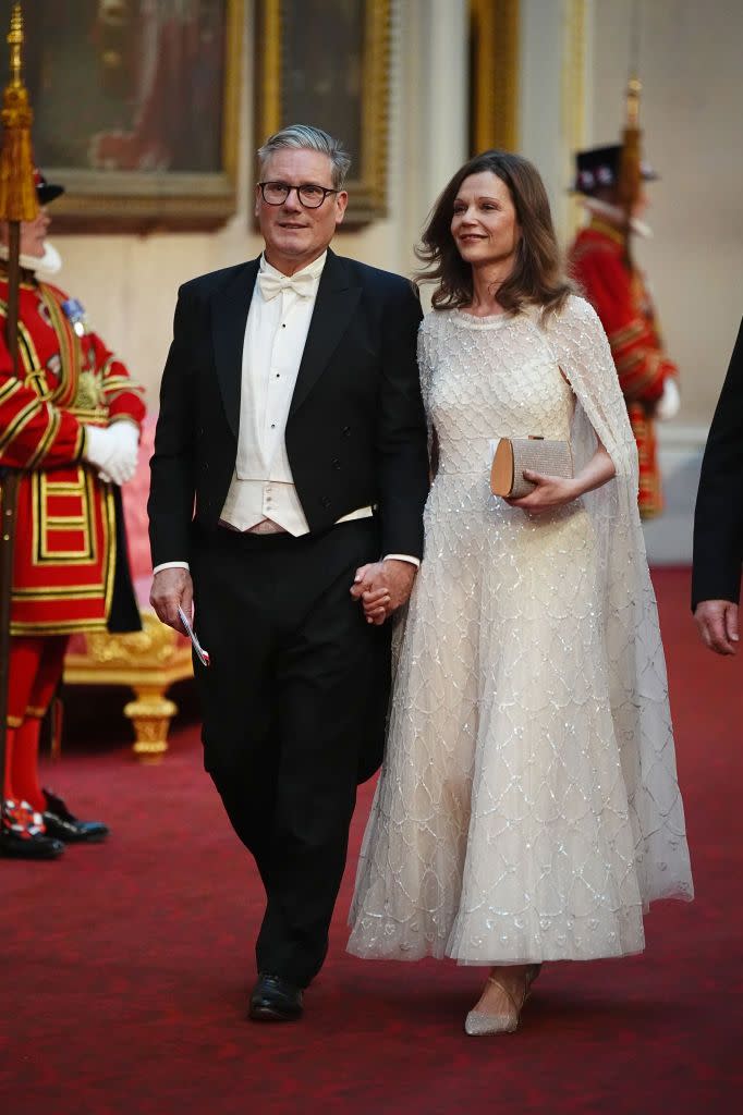 london, england june 25 labour leader sir keir starmer with his wife victoria starmer make their way along the east gallery to attend the state banquet for emperor naruhito and his wife empress masako of japan at buckingham palace on june 25, 2024 in london, england the japanese royal couple arrived in britain for a three day state visit hosted by king charles iii photo by aaron chown wpa poolgetty images