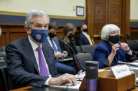 Federal Reserve Chairman Jerome Powell and Treasury Secretary Janet Yellen, listen to lawmakers during a House Committee on Financial Services hearing on Capitol Hill in Washington, Wednesday, Dec. 1, 2021. (AP Photo/Amanda Andrade-Rhoades)