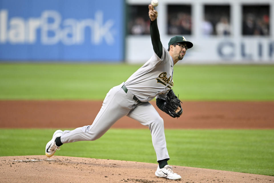 Oakland Athletics starting pitcher Joe Boyle delivers during the first inning of the team's baseball game against the Cleveland Guardians, Friday, April 19, 2024, in Cleveland. (AP Photo/Nick Cammett)