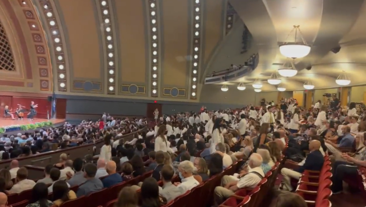 Medical school students staged a walkout during the University of Michigan’s White Coat Ceremony on Sunday, 25 July 2022 (Twitter/Scorpiio)