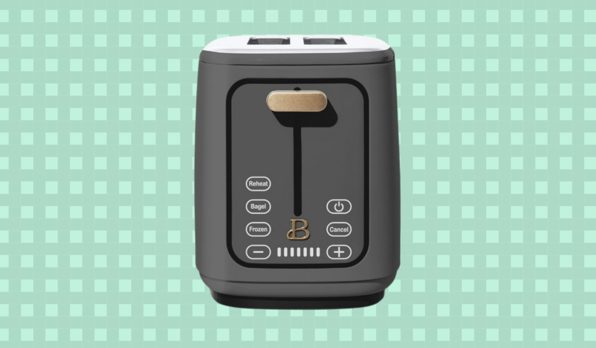 A grey and gold-trimmed digital-screen toaster with a monogrammed 