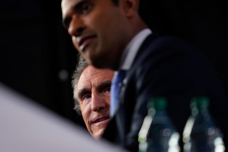 North Dakota Gov. Doug Burgum listens as Vivek Ramaswamy, right, speaks while making media rounds in the Spin Room at Georgia Tech's McCamish Pavilion after the CNN Presidential Debate between President Joe Biden and former President Donald Trump held at CNN's studios in Atlanta. CNN Anchors Jake Tapper and Dana Bash are moderators of the debate.