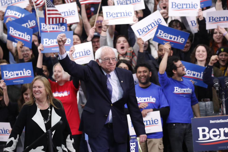 Democratic presidential candidate Sen. Bernie Sanders, I-Vt., with his wife Jane O'Meara Sanders, arrives to speak to supporters at a primary night election rally in Manchester, N.H., Tuesday, Feb. 11, 2020. (AP Photo/Pablo Martinez Monsivais)