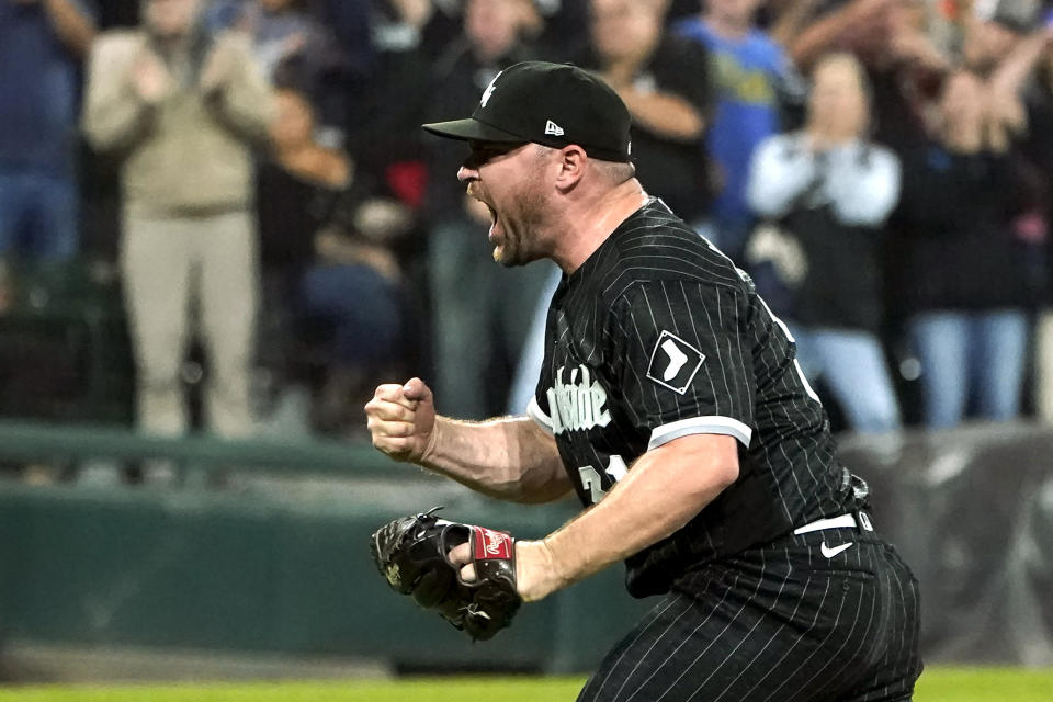 Chicago White Sox relief pitcher Liam Hendriks celebrates the team's 4-3 win over the Houston Astros in a baseball game Tuesday, Aug. 16, 2022, in Chicago. (AP Photo/Charles Rex Arbogast)