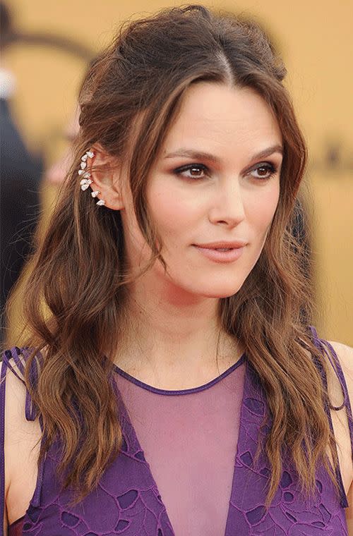 Knightley accessorised her stunning imperial purple gown by Erdem with a Serti Sur Vide pink, gold and diamond ear cuff at the 2015 SAG Awards. We love her wispy half up half down 'do and neutral make up with a splash of smoky mauve shadow.