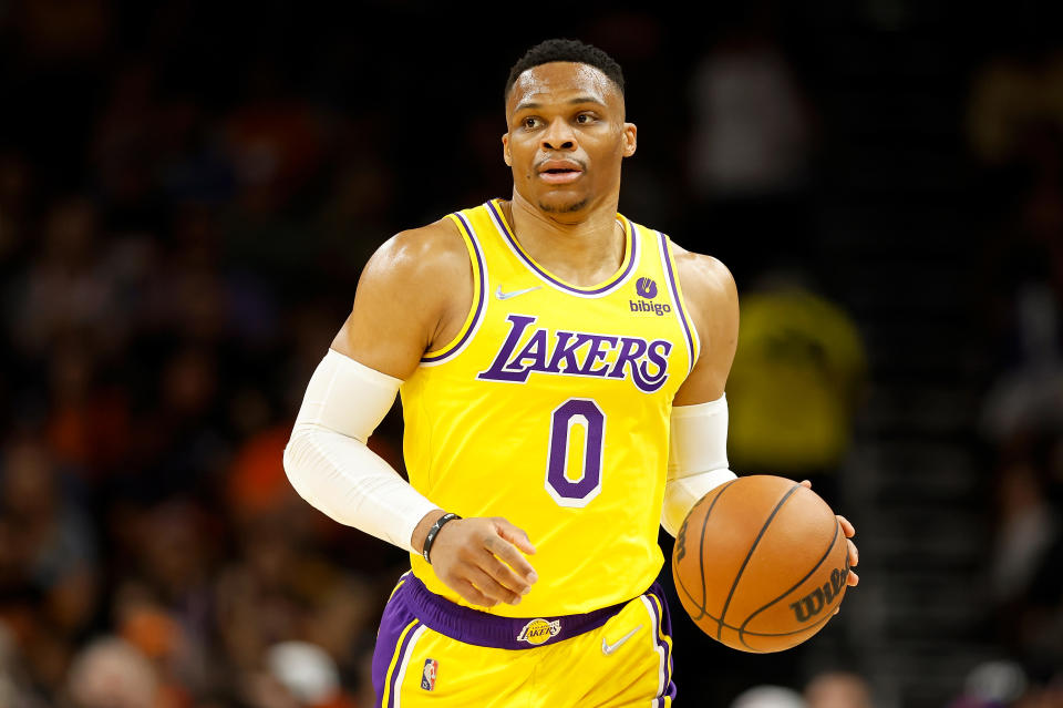 PHOENIX, AZ - APRIL 5: Russell Westbrook #0 of the Los Angeles Lakers handles the ball during the first half of an NBA game at the Footprint Center on April 5, 2022 in Phoenix, Arizona. : By downloading or using this photo, you expressly acknowledge and agree to be bound by the terms of the Getty Images License Agreement.  (Photo by Christian Petersen/Getty Images)