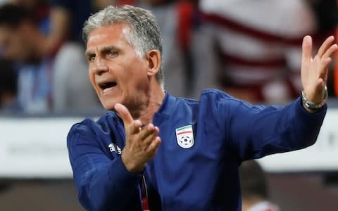 Iran coach Carlos Queiroz during the match  - Credit:  REUTERS