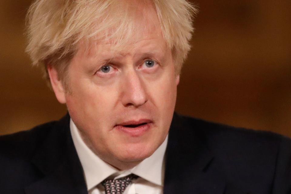 Britain's Prime Minister Boris Johnson speaks during a virtual press conference inside 10 Downing Street in central London on December 16, 2020. - Prime Minister Boris Johnson resisted calls to tighten coronavirus restrictions over Christmas, as London faced stricter measures and concern mounted about case numbers. (Photo by Matt Dunham / POOL / AFP) (Photo by MATT DUNHAM/POOL/AFP via Getty Images)