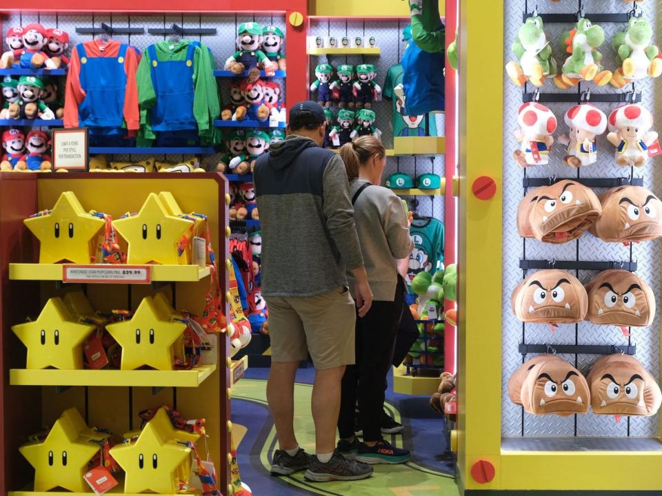Guests shop during a preview of Super Nintendo World at Universal Studios in Los Angeles, California, on January 13, 2023.