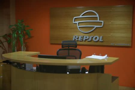 The corporate logo of Repsol is seen in their office in Caracas, Venezuela April 25, 2017. REUTERS/Carlos Garcia Rawlins