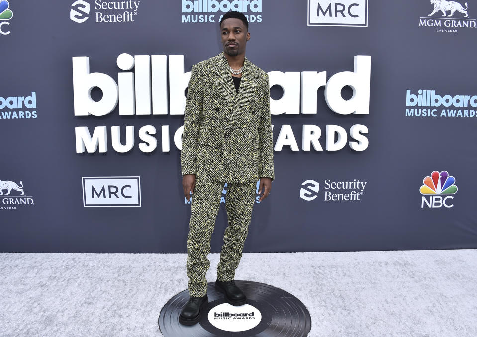 Giveon arrives at the Billboard Music Awards on Sunday, May 15, 2022, at the MGM Grand Garden Arena in Las Vegas. (Photo by Jordan Strauss/Invision/AP)