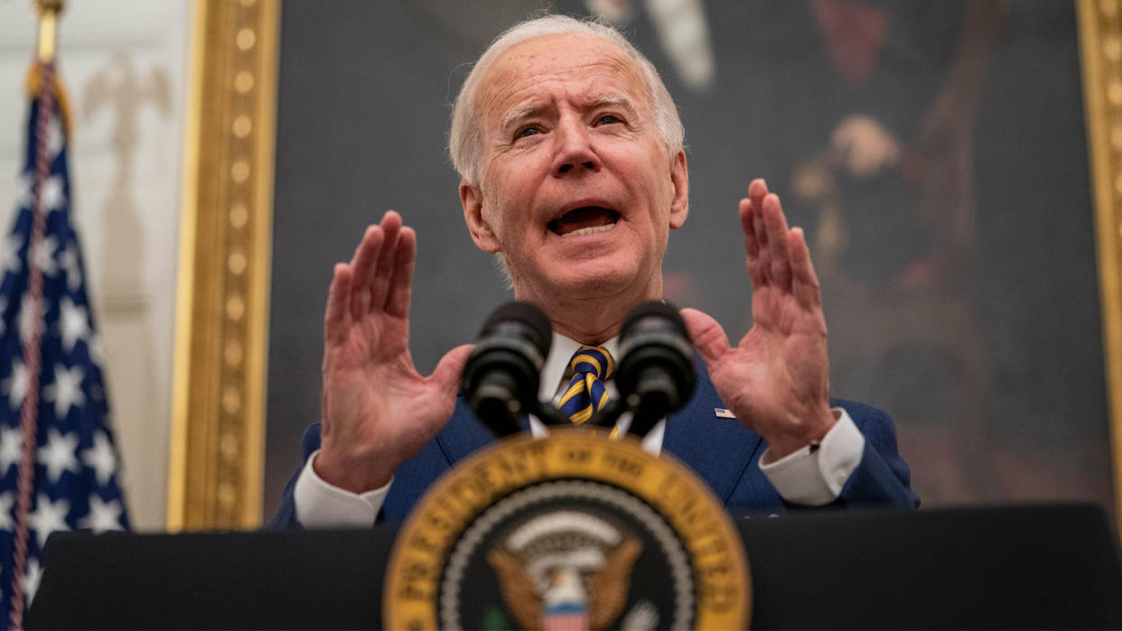 U.S. President Joe Biden speaks on his administrations response to the economic crisis in the State Dining Room of the White House in Washington, D.C., U.S., on Friday, Jan. 22, 2021. (Ken Cedeno/CNP/Bloomberg via Getty Images)