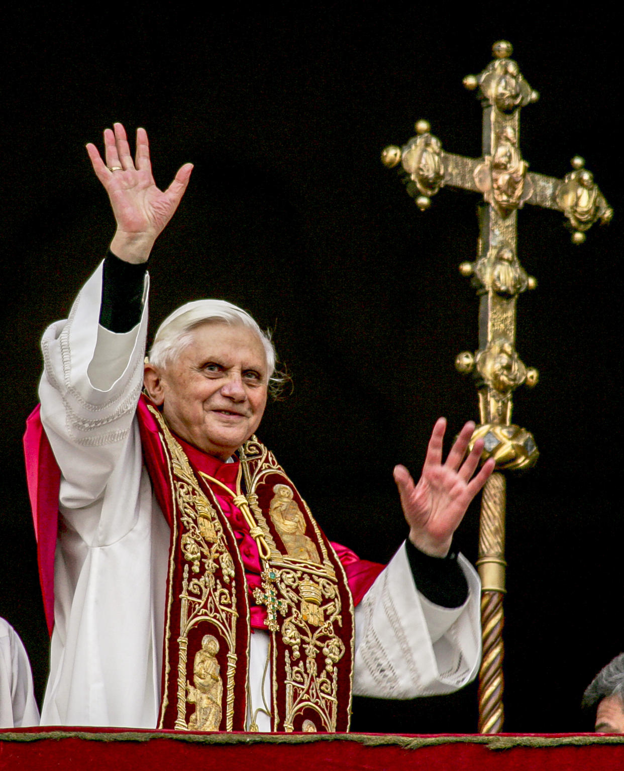 FILE - Pope Benedict XVI greets the crowd from the central balcony of St. Peter's Basilica at the Vatican soon after his election on April 19, 2005. Pope Emeritus Benedict XVI, the German theologian who will be remembered as the first pope in 600 years to resign, has died, the Vatican announced Saturday. He was 95. (AP Photo/Andrew Medichini, File)