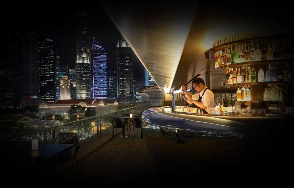 Enjoy a view of MBS and Downtown at Smoke & Mirrors