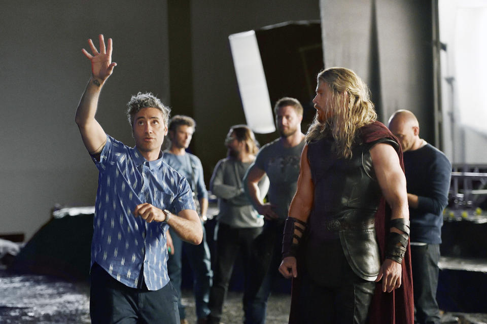 Taika Waititi directing Chris Hemsworth during filming