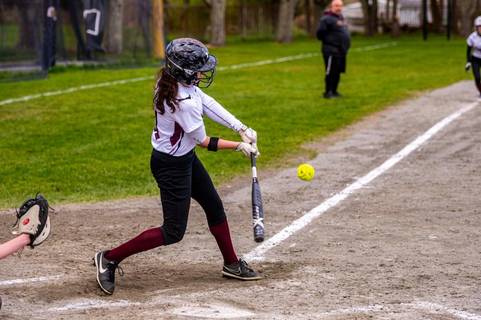 Old Colony's Lindsey Bacchiocchi singles up the middle for the walk off game winning hit as the Cougars picked up the 8-7 victory over Bristol-Plymouth.
