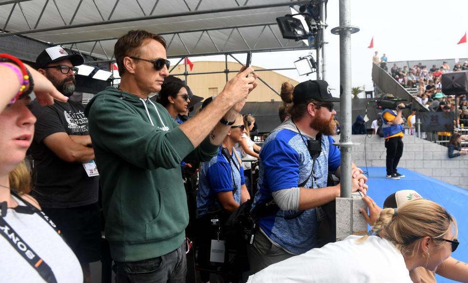 Skateboarding legend Tony Hawk films the Women’s Skateboard Street competition on a sold-out day at the X Games at the Ventura County Fairgrounds on Saturday.