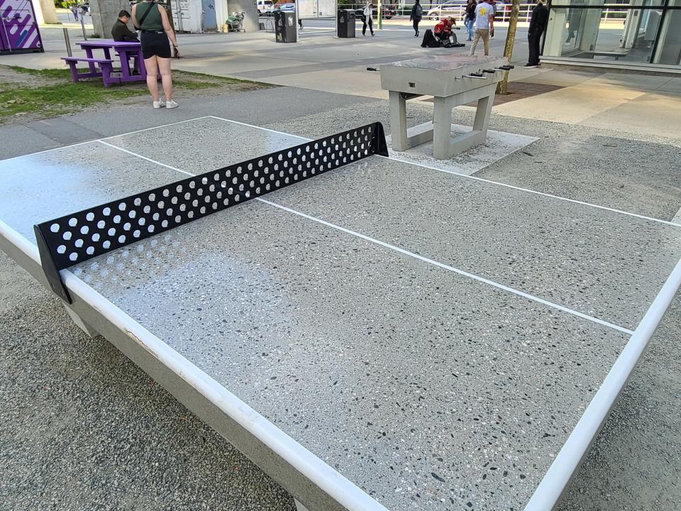 Table tennis and foosball tables the City of Burnaby placed near the Metrotown SkyTrain station as part of its Parkway Alive activities for the summer