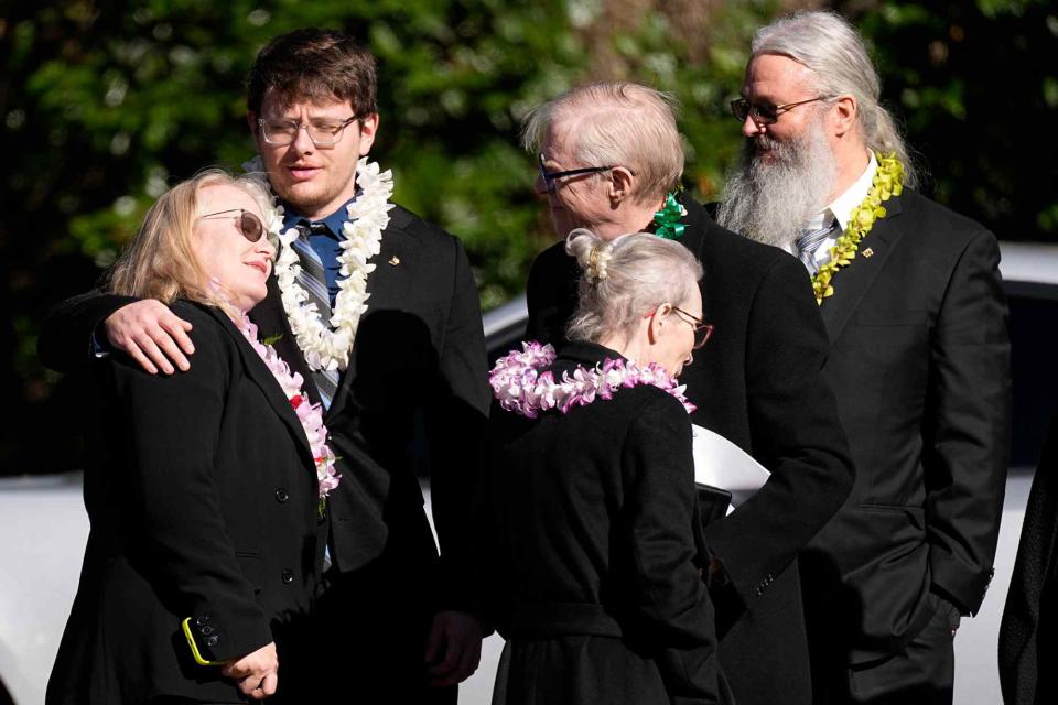 <p>John Bazemore/AP Photo</p> The Carter family at the funeral of Rosalynn Carter