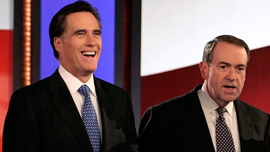 <em>Mitt Romney and Mike Huckabee participate in a televised debate at Saint Anselm College on Jan. 5, 2008, in Manchester, New Hampshire.</em> (Photo by Chip Somodevilla/Getty Images)