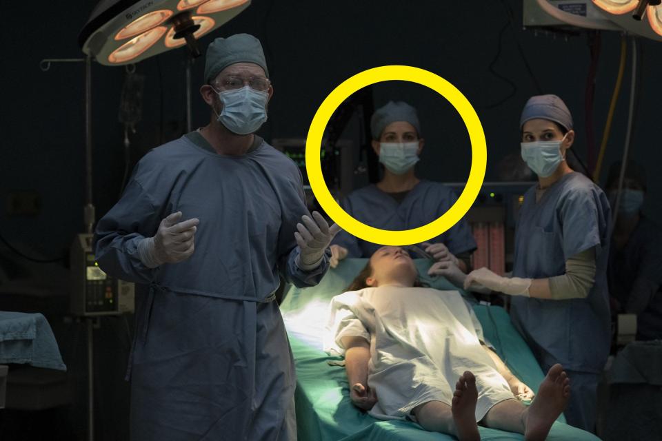 The surgeon and two nurses (one of which is Laura Bailey) with Ellie in the finale