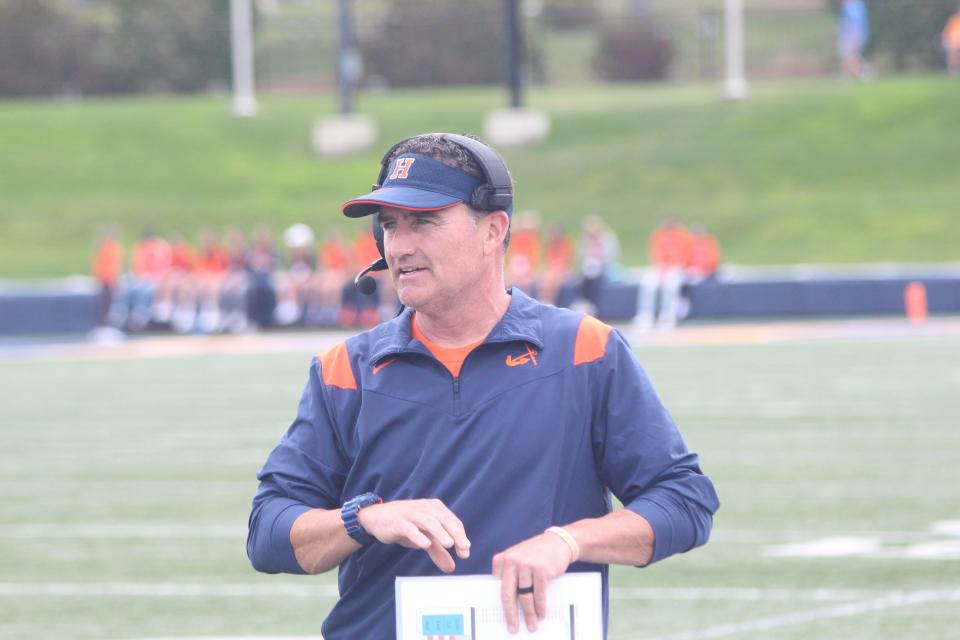 Hope College football coach Peter Stuursma patrols the sideline during a game against Kalamazoo in 2021