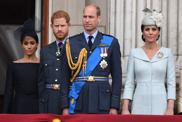 (left to right) The Duchess of Sussex, Duke of Sussex, Duke of Cambridge and Duchess of Cambridge on the balcony at Buckingham Palace  (Victoria Jones/PA)