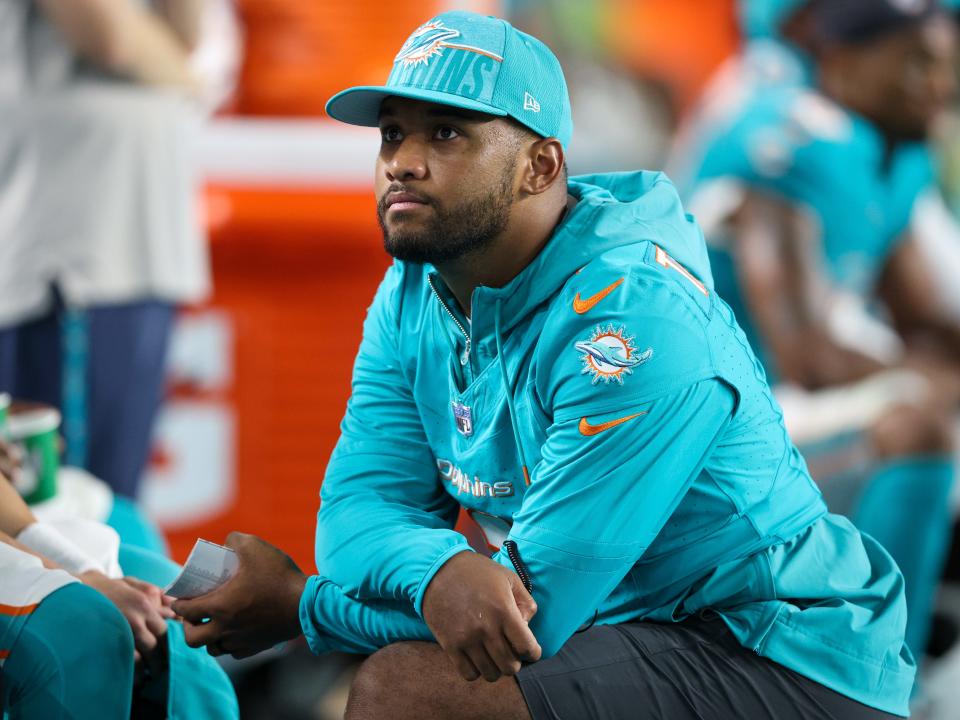 Aug 11, 2023; Miami Gardens, Florida, USA;  Miami Dolphins quarterback Tua Tagovailoa (1) looks on against the Atlanta Falcons in the fourth quarter at Hard Rock Stadium. Mandatory Credit: Nathan Ray Seebeck-USA TODAY Sports