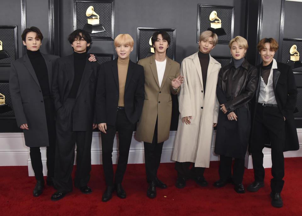 FILE - BTS arrives at the 62nd annual Grammy Awards in Los Angeles on Jan. 26, 2020. The Grammy Museum is launching its own online streaming service featuring performances and interviews from A-list musicians, as well as material from the museum’s archive. On Sept. 24, newly recorded content from BTS, Tame Impala, Rufus Wainwright, The War and Treaty and more will be available. (Photo by Jordan Strauss/Invision/AP, File)