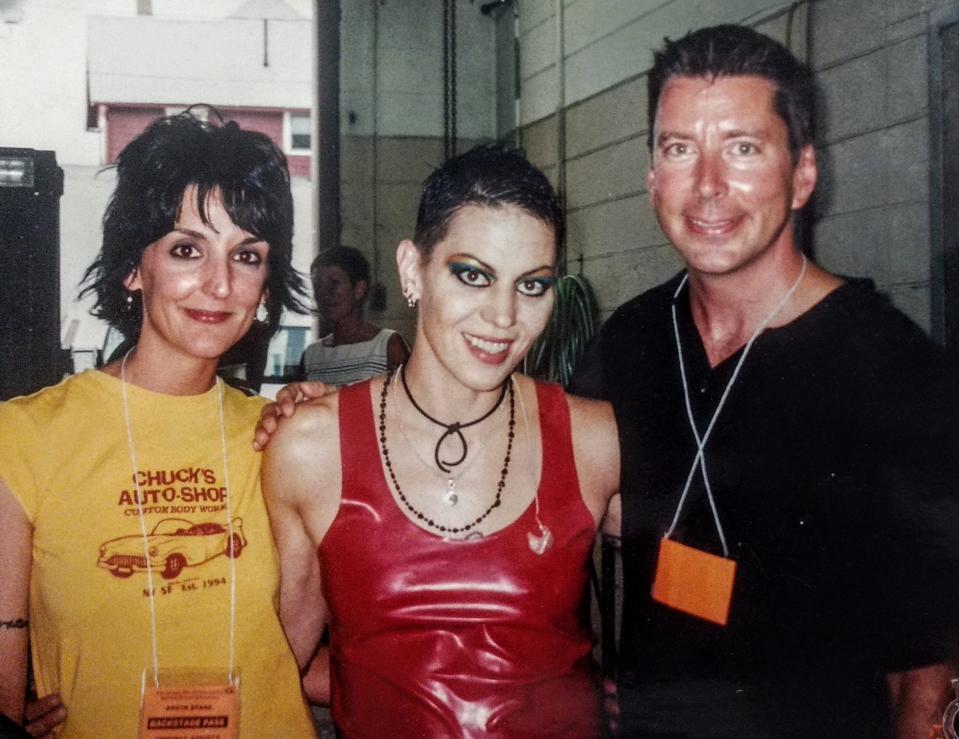 Dan Kane and Terry DeMio, former Canton Repository editor, far left, meet Joan Jett backstage before her 2001 performance in downtown Canton during the Pro Football Hall of Fame Enshrinement Festival.