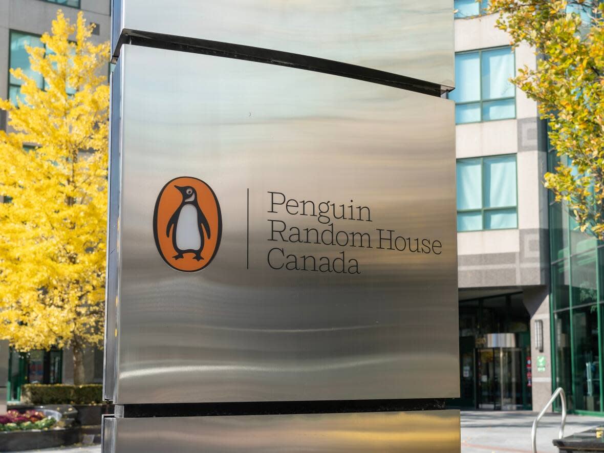 A Penguin Random House Canada sign is seen outside its head office in Toronto on Oct. 28, 2020. A Toronto woman named Zoe Charlotte Greenberg alleged in a Dec. 6 post that the company, which is the country's largest book publisher, had knowingly published a memoir that depicted her sexual assault as consensual. (JHVEPhoto/Shutterstock - image credit)