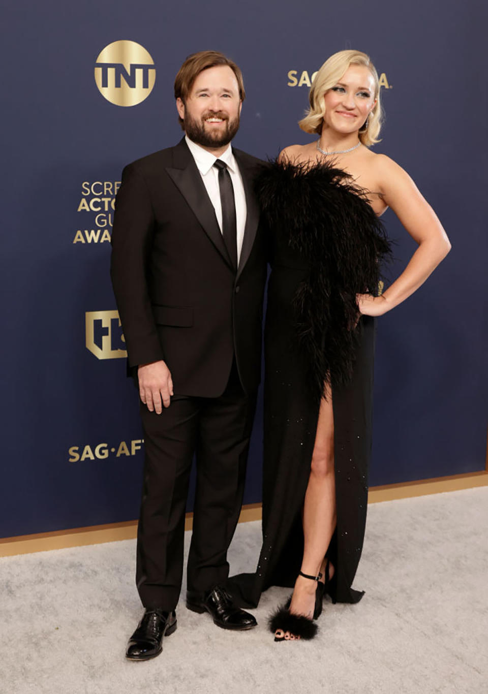 Haley Joel Osment and sister Emily Osment at an awards ceremony.