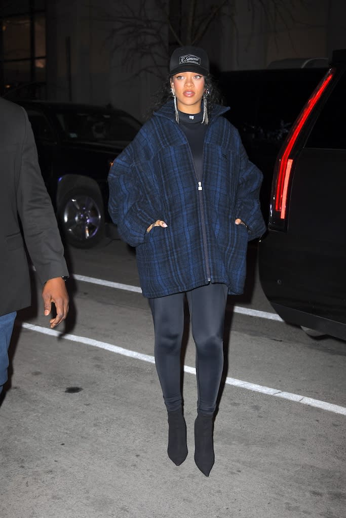Rihanna out and about in a plaid jacket and black boots in NYC on Jan. 25, 2022. - Credit: WavyPeter / SplashNews.com