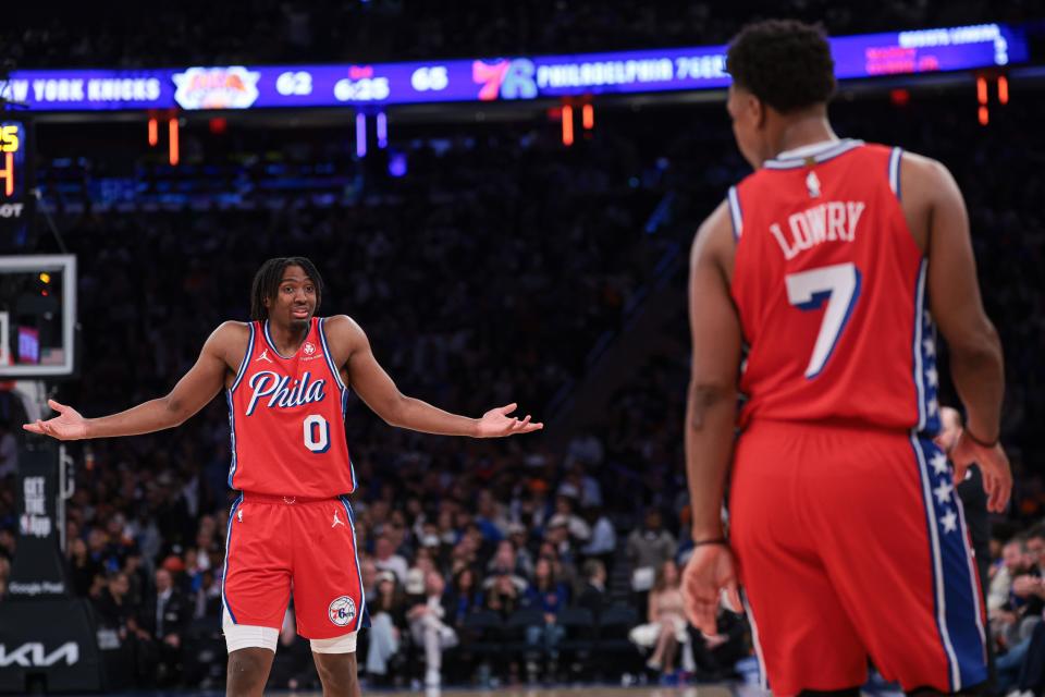 Philadelphia 76ers guard Tyrese Maxey gestures toward guard Kyle Lowry after an official's call went against the team in Monday's 104-101 loss to the New York Knicks.