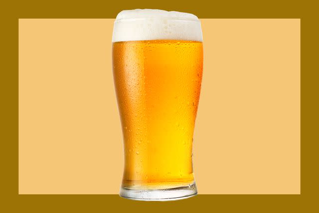 <p>Food & Wine / Getty Images</p> A cold beer in a glass