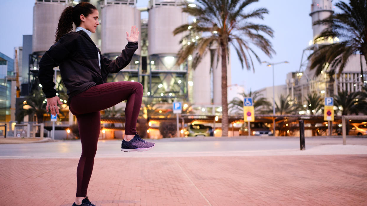  Woman performs a running drill. 