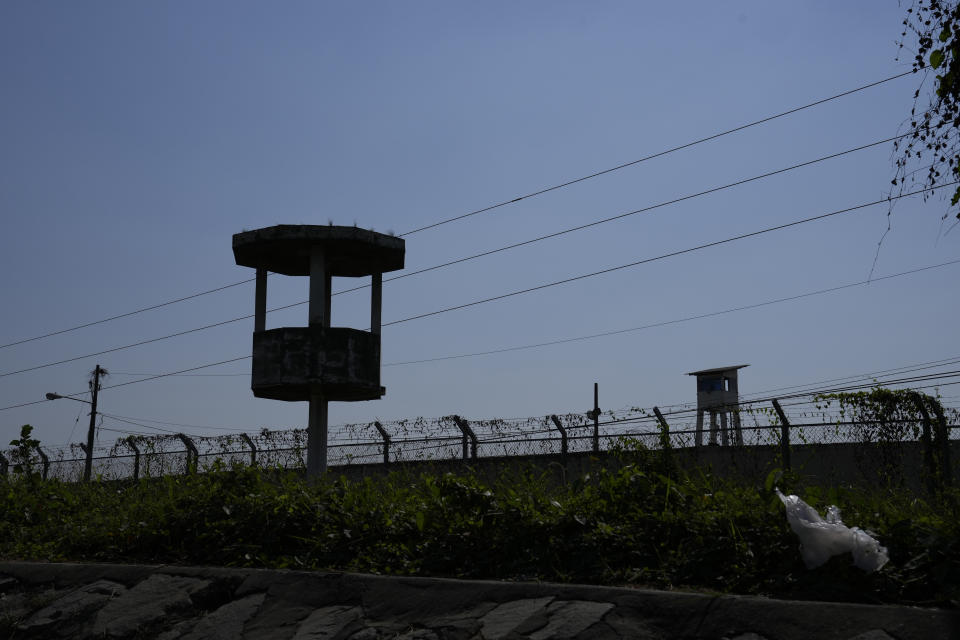 A watch tower stands empty inside Litoral Penitentiary after deadly fights inside the jail in Guayaquil, Ecuador, Thursday, July 22, 2021. Rival gangs of inmates fought in two prisons in Ecuador, killing at least 18 people and injuring dozens, authorities said Thursday. (AP Photo/Dolores Ochoa)